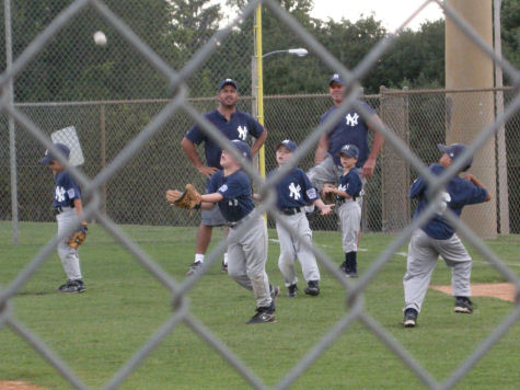 Cody getting ready to play their last 2009 baseball game!
