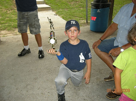 Cody holding his 2009 baseball trumpet!